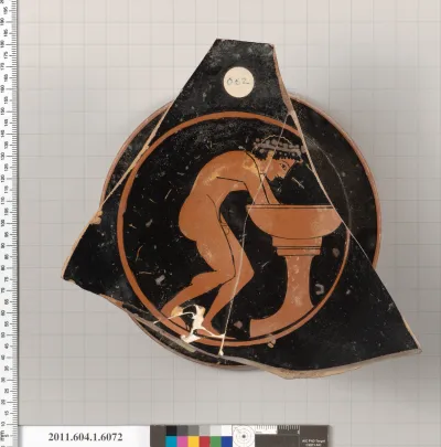 Terracotta fragment of a kylix (drinking cup)