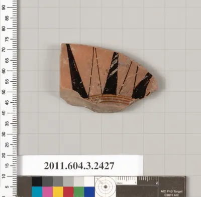 Terracotta fragment of a kylix: eye-cup (drinking cup)