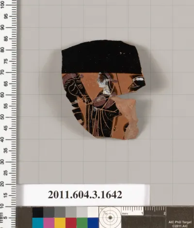 Terracotta fragment of a kylix: Band cup (drinking cup)