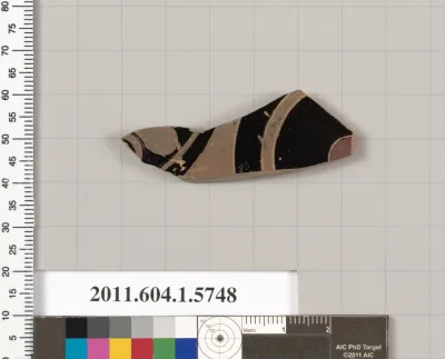 Terracotta fragment of a kylix: eye-cup  (drinking cup)