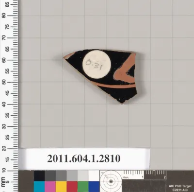 Terracotta fragment of a kylix (drinking cup)