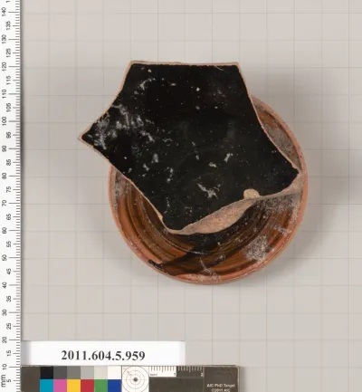 Terracotta fragment of a kylix (drinking cup)