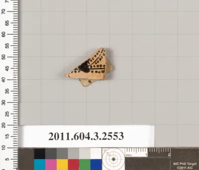 Terracotta fragment of a kylix (drinking cup)