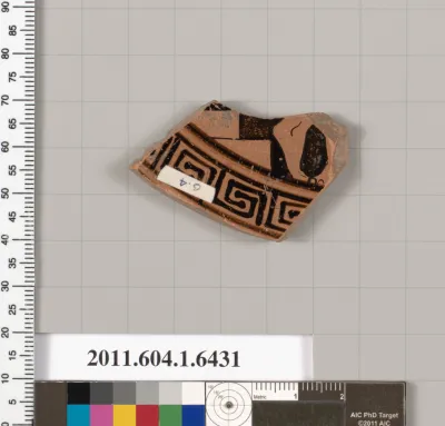 Terracotta fragment of a kylix (drinking cup)