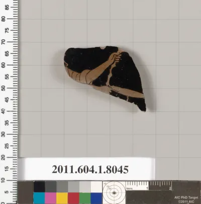 Terracotta fragment of a kylix (drinking cup)