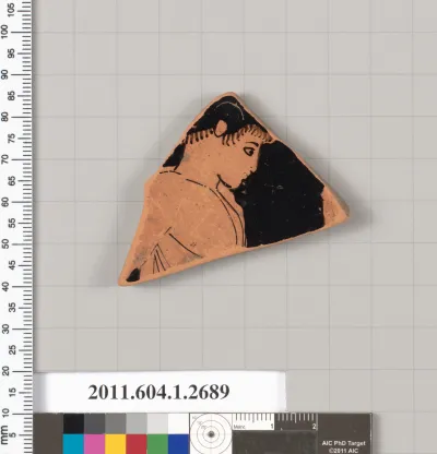 Terracotta fragment of a kylix (drinking cup)