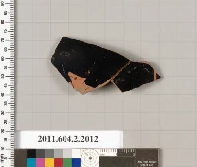 Terracotta fragment of an oinochoe: chous (jug)?