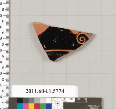 Terracotta fragment of a kylix: eye-cup  (drinking cup)