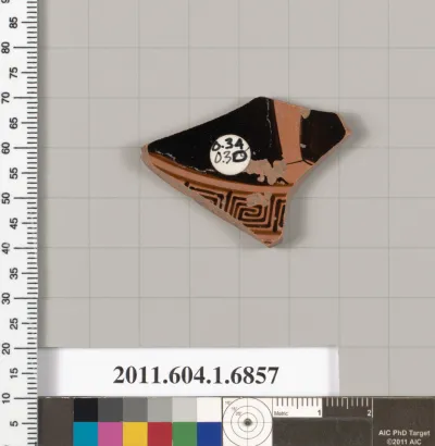 Terracotta fragment of a kylix (drinking cup)