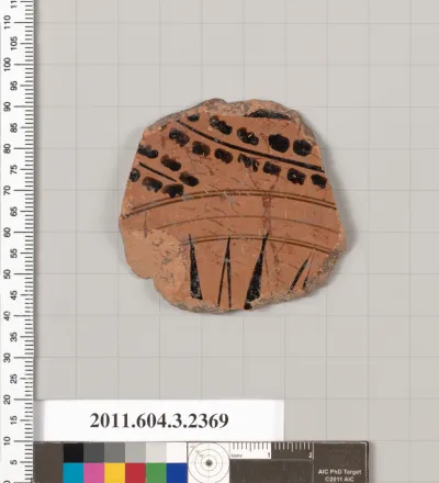 Terracotta fragment of a kylix: eye-cup (drinking cup)