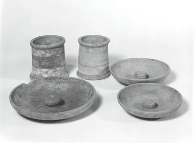 Group of Etruscan Phialai (3), Chalices (2) and an Urn
