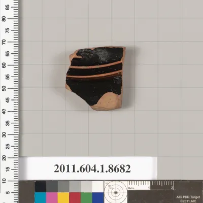 Terracotta fragment of a stemless kylix (drinking cup)