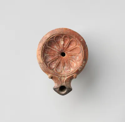 Terracotta oil lamp