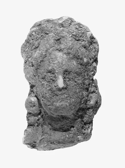 Female Head with Melon Coiffure and Bow Knot