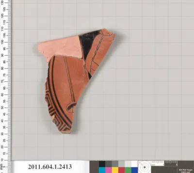 Terracotta fragment of a kylix (drinking cup)