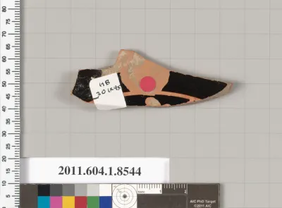 Terracotta fragment of a stemless kylix (drinking cup)