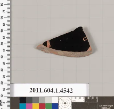 Terracotta fragment of a kylix (drinking cup)