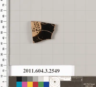 Terracotta fragment of a kylix (drinking cup)