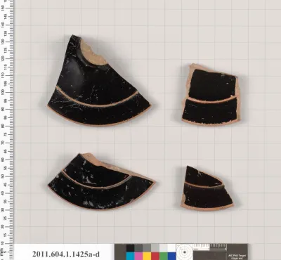 Terracotta fragments of kylikes (drinking cups)