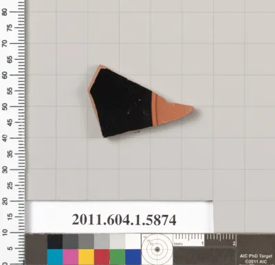 Terracotta fragment of a kylix (drinking cup)