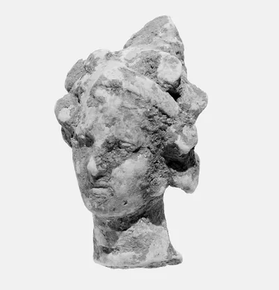 Head with Bow Knot and Wreath