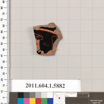 Terracotta fragment of a kylix (drinking cup)