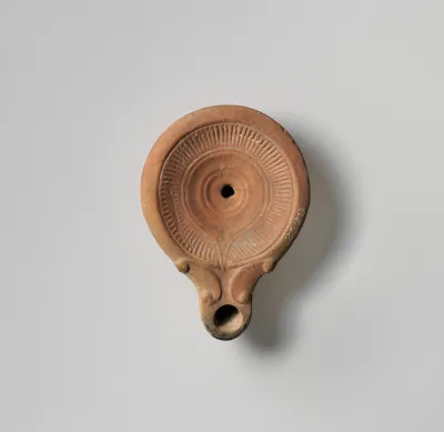 Terracotta oil lamp