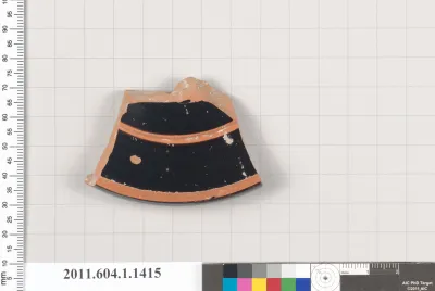 Terracotta fragment of a kylix (drinking cup)