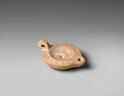 Terracotta oil lamp