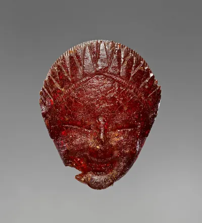 Pendant: Head of a Female Divinity or Sphinx