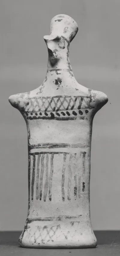 Figurine with Pinched Face and Geometric Decorations
