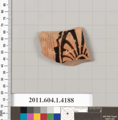 Terracotta fragment of a kylix (drinking cup)