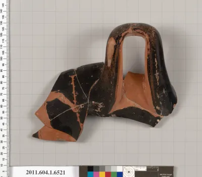 Terracotta rim fragment of a kylix (drinking cup)