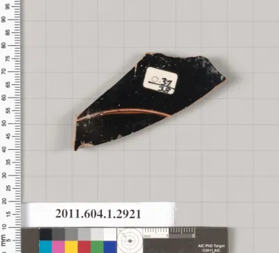 Terracotta fragment of a kylix (drinking cup)