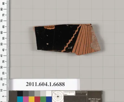 Terracotta fragment of a kylix (drinking cup)