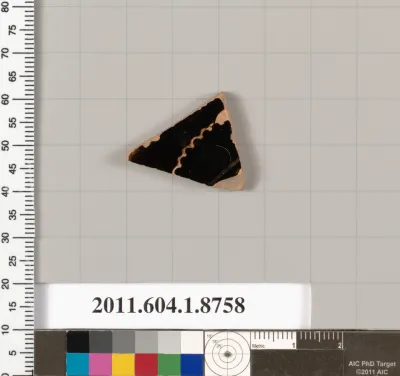 Terracotta fragment of a kylix (drinking cup)