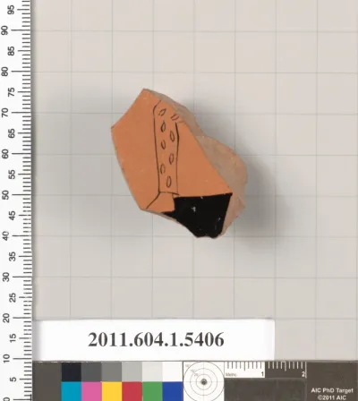 Terracotta fragment of a kylix (drinking cup)