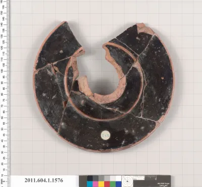 Terracotta fragment of a kylix (drinking cup)