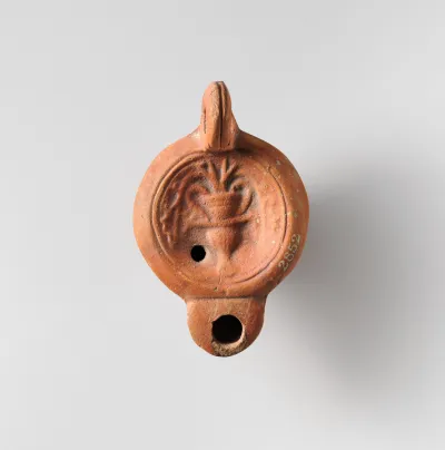 Terracotta oil lamp