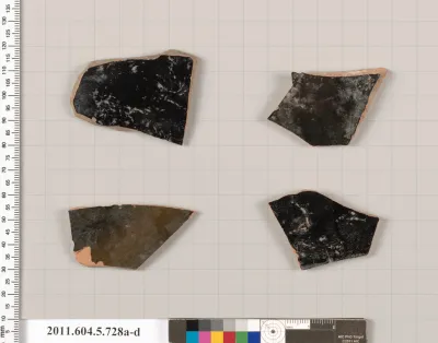 Terracotta fragments of kylikes (drinking cups)