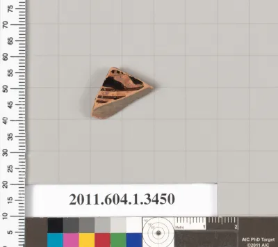 Terracotta fragment of a kylix (drinking cup)