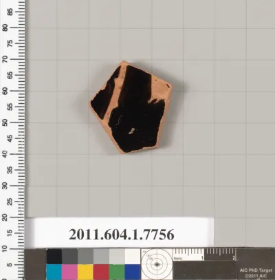 Terracotta fragment of a kylix (drinking cup)