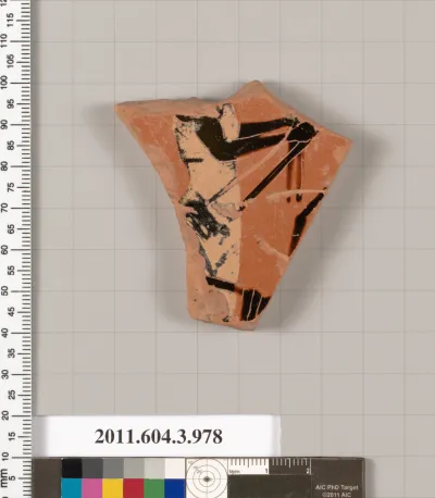 Terracotta fragment of a lekanis lid (covered dish)