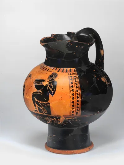 Sf. Kanne [Komm.: Vgl. Fragment einer Kanne in Oxford 1955.454. Siehe Brief v. A.J. Clark, MMA 3.12.78.] (Bauchige, attische, schwarzfigurige Kleeblattkanne ("Weinkanne") mit hohem Fuß)