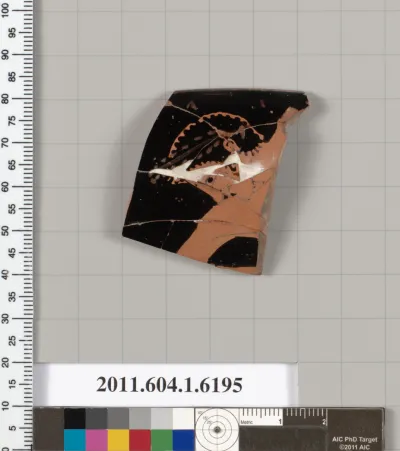 Terracotta rim fragment of a kylix (drinking cup)