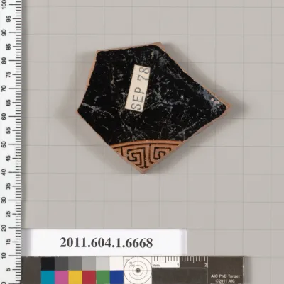 Terracotta fragment of a kylix (drinking cup)