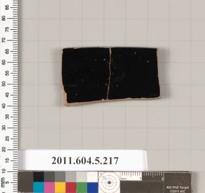 Terracotta rim fragment of a kylix (drinking cup)