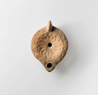Terracotta oil lamp