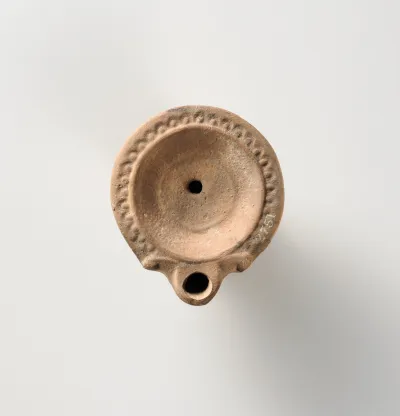 Terracotta oil lamp