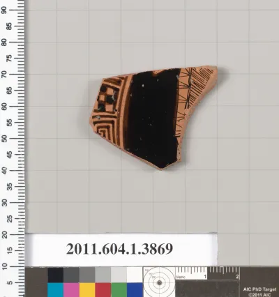 Terracotta fragment of a kylix (drinking cup)